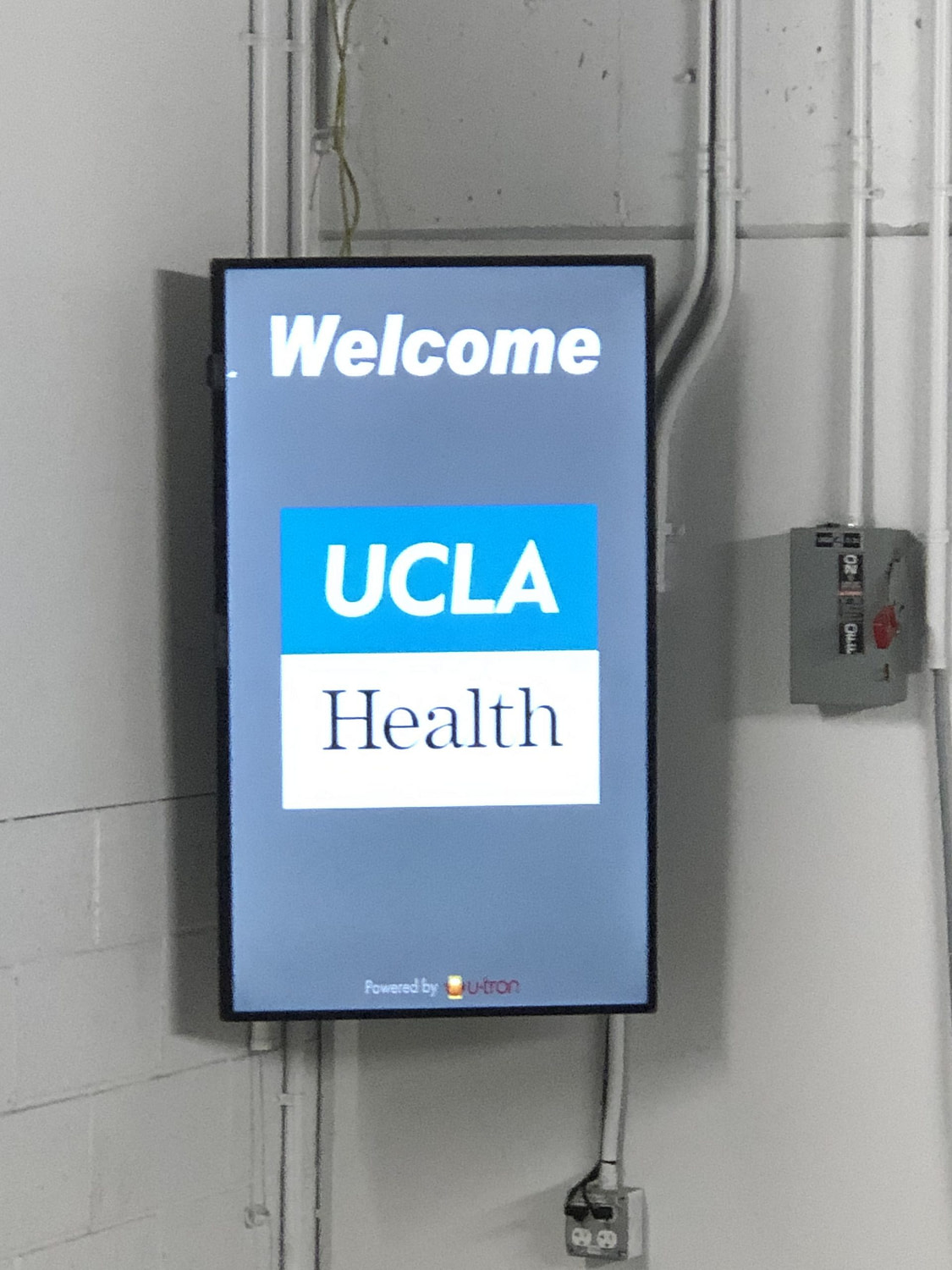 Welcome sign to the UCLA parking garage