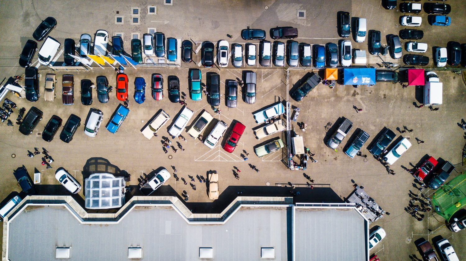 Vehicles at a conventional parking garage parked in an inefficient arragement