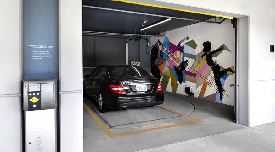 Car enters the automated parking system's bay room 